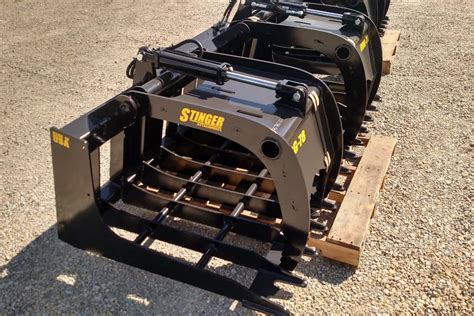 how to use a root grapple on a skid steer|best skid steer brush grapple.